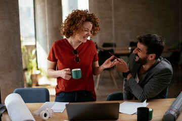 Businessman and businesswoman in office. Businesswoman and businessman working on the project..