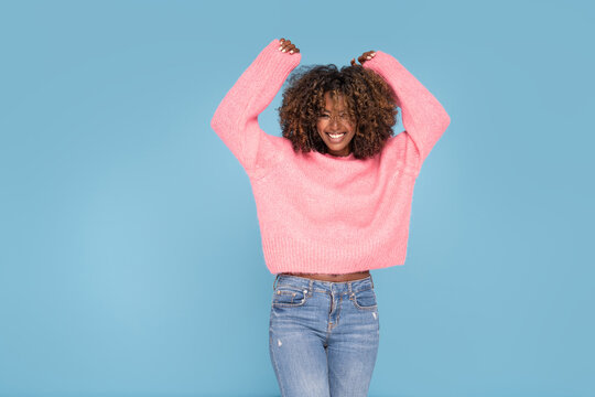 Happy Smiling Afro Girl In Pink Sweater