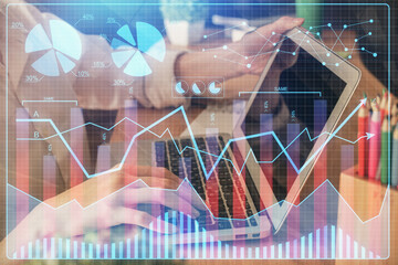 Double exposure of woman hands typing on computer and forex chart hologram drawing. Stock market invest concept.
