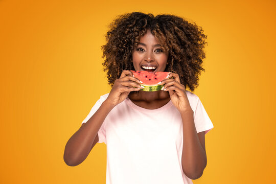 Afro Girl Eating Watermelon .