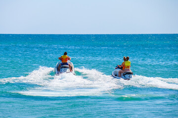 a man rides a jet ski in the open sea