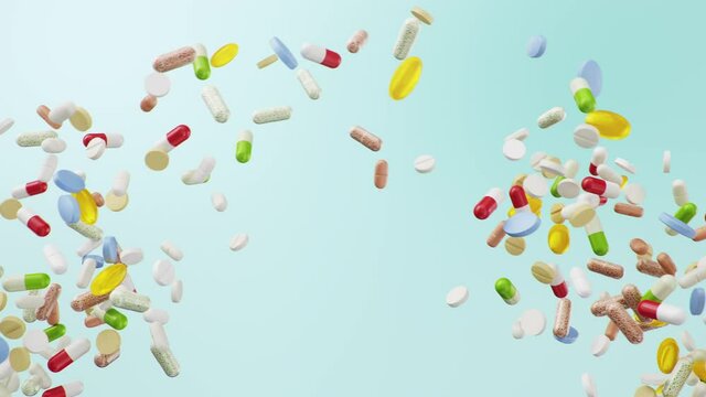 Slow motion animation, pills collide into each other in flight. Multi-colored capsules and tablets: antibiotics, vitamins, dietary supplements. Population health care concept, 4k 3D Animation