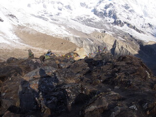 Snow-covered Himalayas and the shadow of the climbers, ABC (Annapurna Base Camp) Trek, Annapurna, Nepal