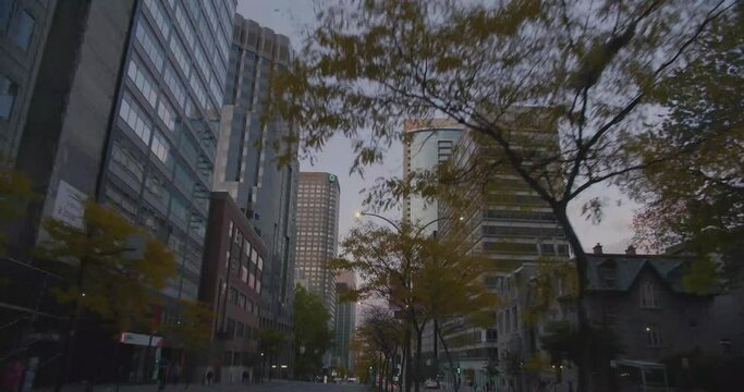 Montreal, Canada - April 15th 2017 : Driving on Rene Levesque Boulevard, worm eye view of Downtown towers, Complexe Desjardins, Hotel Courtyard Marriott.