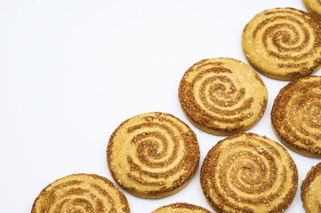 Round cookies sprinkled with sugar. Round cookies. Curled cookies with sugar.