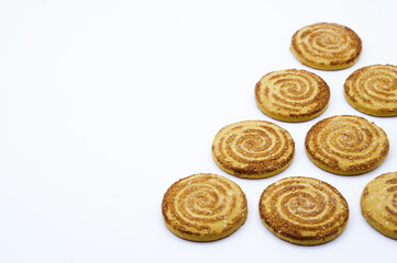 Round cookies sprinkled with sugar. Round cookies. Curled cookies with sugar.