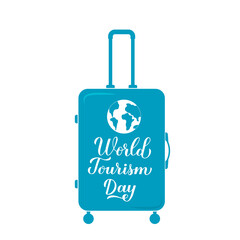 World Tourism Day calligraphy hand lettering on blue suitcase. Vector template for typography poster, greeting card, postcard, banner, flyer, sticker, t-shirt, etc