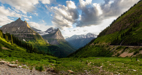 Naklejka na ściany i meble Mountains at Sunset in Glacier National Park along the Going to the Sun Road