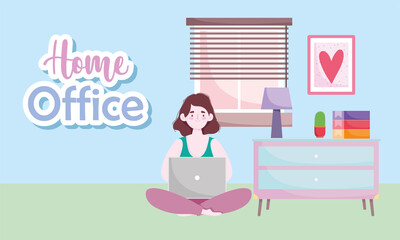 home office workspace, woman using laptop sitting floor in room with table lamp plant and books