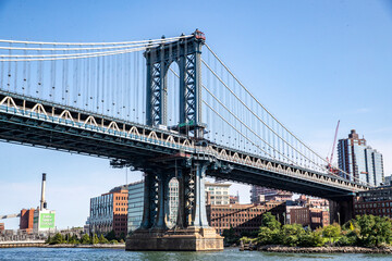 Fototapeta na wymiar A view of the Manhattan Bridge from the East River in New York City.