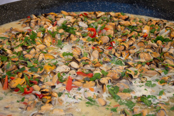shells with vegetables and shrimp in wine