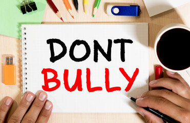 Red and White triangular warning road sign with a Don't Feed The Troll concept against a partly...