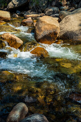 water flowing over rocks in stream in the Eastern Sierra Nevada mountains of California