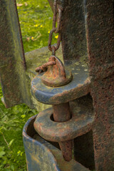 The link pin and chain assembly on disused iron ore cart.  
