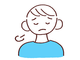 ため息をつく若い男性