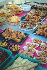 Table full of tasty food beautifully decorated.