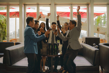 businesspeople having fun together to celebrate friendship