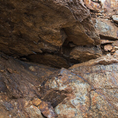 Grunge stone background. Rocky surface. Brown stone background.