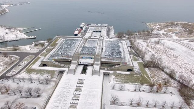 An aerial view of the white snow on the abandoned city hall in Tallinn Estonia