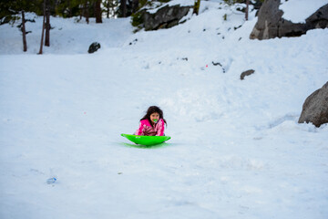 Fototapeta na wymiar child playing with snow