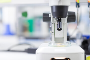 Close up of binocular Stereo Microscope at laboratory, Concept Science and Technology