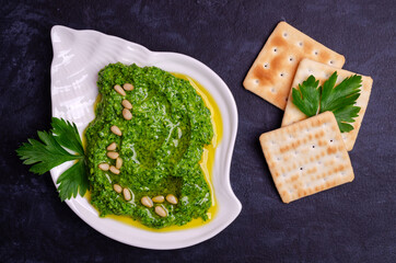 Green sauce in a ceramic bowl