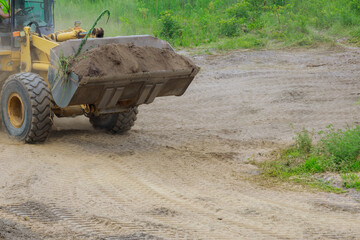 Bulldozer digging ground during of moving earth a soil