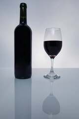 Bottle and glass of red wine
