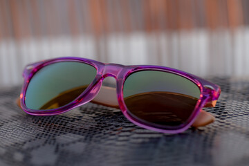 Classic sunglasses model shoot in a summer day . Selective focus