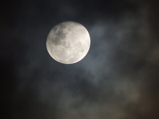 Bright moon through mist
