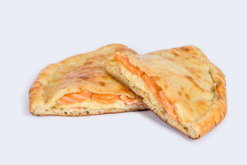 Calzone cut on a white plate for tenderloin