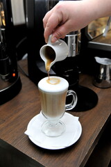 coffee, drink, cup, cafe, cappuccino, latte, beverage, glass, milk, hot, table, espresso, breakfast, brown, caffeine, white, mug, macchiato, cream, food, restaurant, mocha, chocolate, morning, saucer