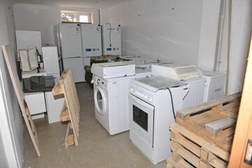 kitchen, interior, equipment in the warehouse, appliances, washing machine and refrigerators, room,...