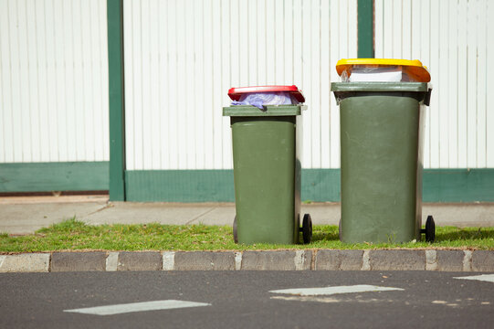 Recycling bin stands outdoor. Australia, Melbourne.
