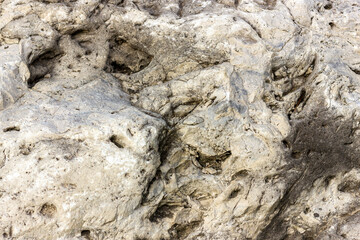 The texture of natural stone on the cut is a material for creative developments in the field of landscape design.