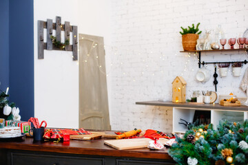 Wooden table in front of Christmas light night, abstract round bokeh background.