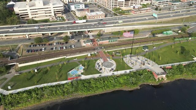 Aerial drone footage of Riverfront park Springfield Massachusetts, parallel shot 60p