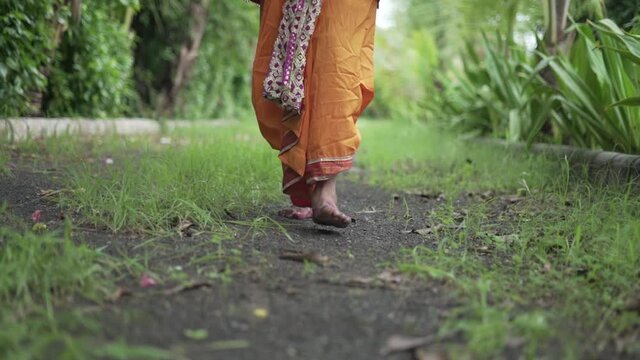 Man Barefoot Walking in Slow Motion| Hindu God Dress 