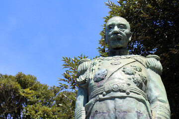 Statue of Admiral Togo Heihachiro overlooking sea in Tagayama Park in Kagoshima