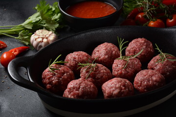 Raw uncooked meatballs.Ready for cooking 