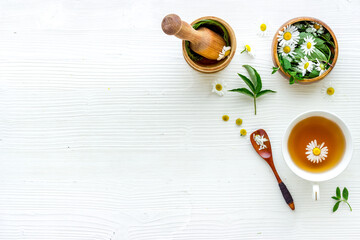 Layout of herbal tea with fresh summer herbs and wild flowers