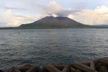 Closeup view of  Sakurajima seen around Kamoikekaizuri Park during sunset