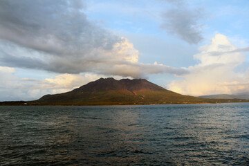 Sakurajima getting dark around Kamoikekaizuri Park during sunset