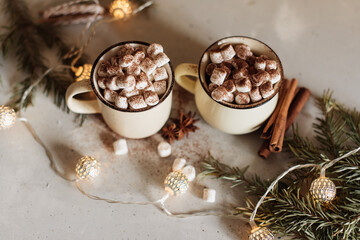 Mug for mockup near christmas tree and gift boxes.