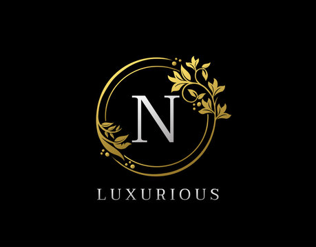 Luxury Circle N Letter Floral Design. Elegant Gold N Royal Logo Icon.