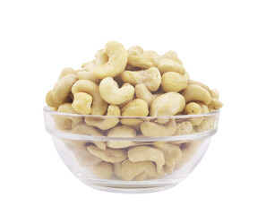 Cashew nuts in glass bowl isolated on white 