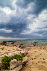 Dramatic storm clouds and rain over the Adriatic Sea in summer