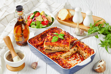 Plant-based lasagna with tofu on a baking dish