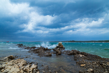 Dramatic storm clouds and rain over the Adriatic Sea in summer