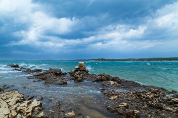 Dramatic storm clouds and rain over the Adriatic Sea in summer